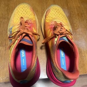 Hoka Orange and Yellow Running Shoes